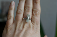 Load image into Gallery viewer, A woman&#39;s hand with a Kathrin Jona Aquamarine Crystal Ring on it.
