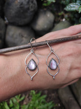 Load image into Gallery viewer, A hand holding a pair of Kathrin Jona Pink Mother of Pearl Drop Granulation Earrings.

