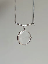 Load image into Gallery viewer, The Clear Quartz Moto Necklace by Kathrin Jona features a round, Clear Quartz pendant gracefully hanging from an upcycled silver chain against a simple background.
