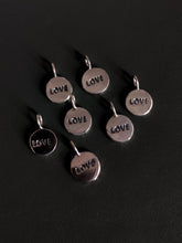 Load image into Gallery viewer, Five Kathrin Jona sterling silver &#39;LOVE&#39; charms with a loop for easy attachment.
