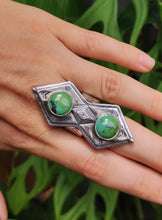Load image into Gallery viewer, A woman&#39;s hand is holding a Kathrin Jona Green Shield Turquoise Ring #1.
