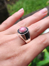 Load image into Gallery viewer, A woman wearing a Rhodochrosite Silver Signet Ring by Kathrin Jona.
