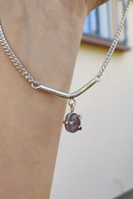 Load image into Gallery viewer, A woman is holding a Kathrin Jona silver Amethyst Moto Bar Necklace.
