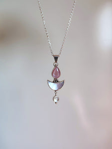 A Kathrin Jona silver necklace with a pink Mother of Pearl Moonstone pendant.