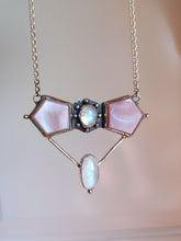 Load image into Gallery viewer, A Kathrin Jona Mother of Pearl Statement Necklace with a pink and white stone on it.
